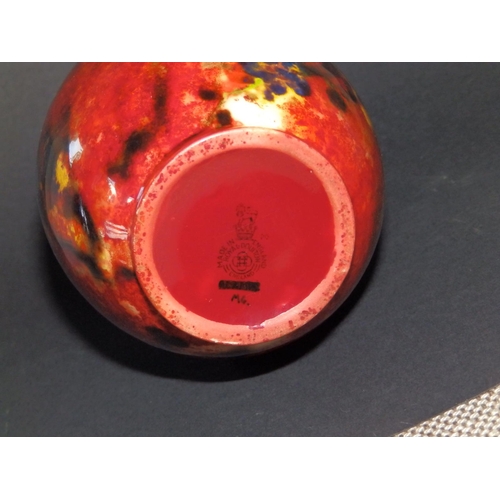 44 - A Royal Doulton flambe vase, exhibiting a range of mottled coloured glazes - 'MG', 6.5