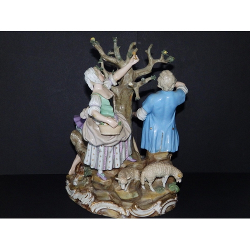 61 - A 19thC Meissen porcelain allegorical figure group after Acier depicting an applepicker with shepher... 