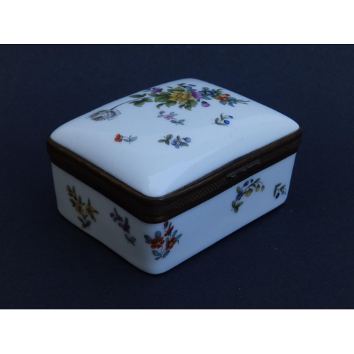 63 - An antique gilt metal mounted German porcelain box in Meissen style, of rectangular form, decorated ... 