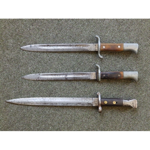 70 - Two WWI bayonets and three others. (5)