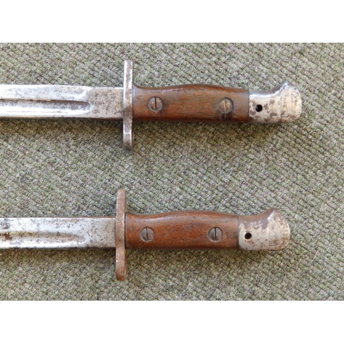 70 - Two WWI bayonets and three others. (5)