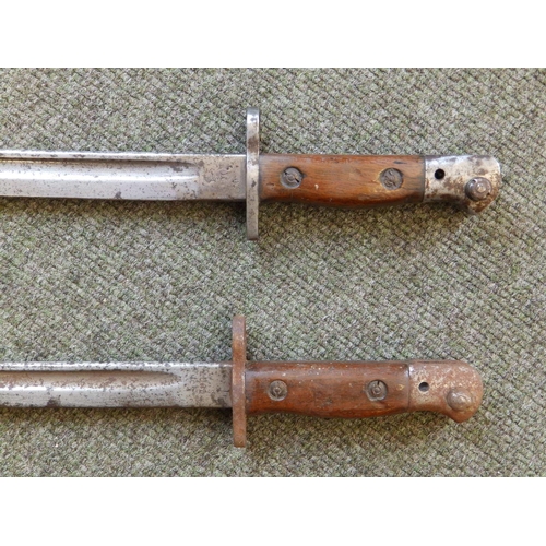 70 - Two WWI bayonets and three others. (5)