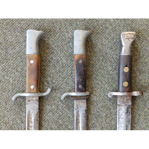 70 - Two WWI bayonets and three others. (5)