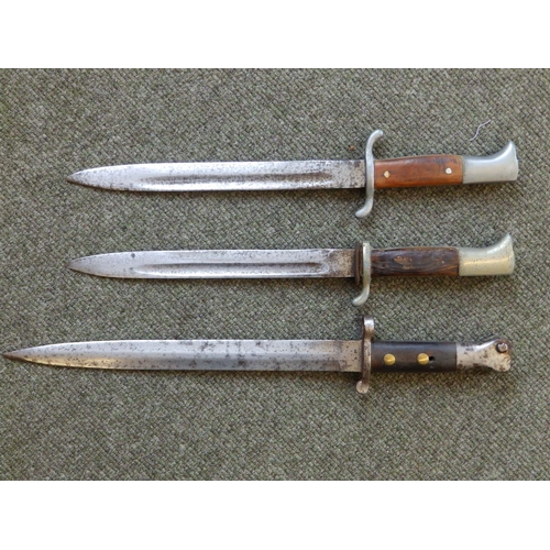 70 - Two WWI bayonets and three others. (5)