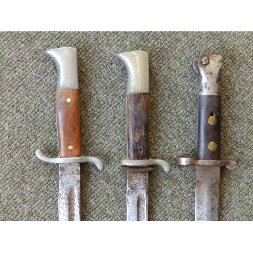 70 - Two WWI bayonets and three others. (5)