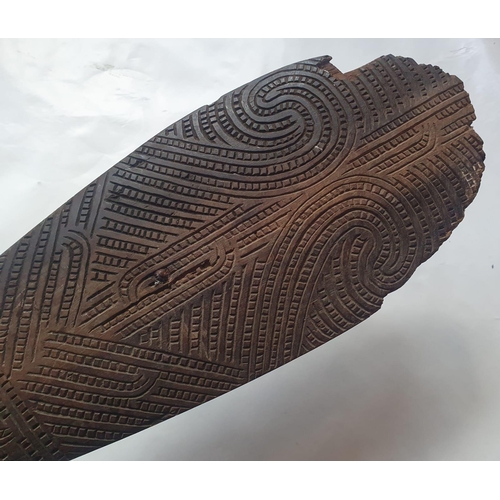 71 - A Maori wood Patu, decorated on both sides, 17.75