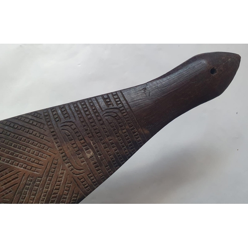 71 - A Maori wood Patu, decorated on both sides, 17.75