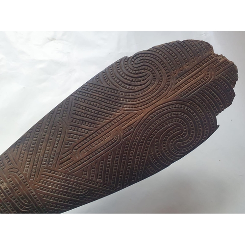 71 - A Maori wood Patu, decorated on both sides, 17.75