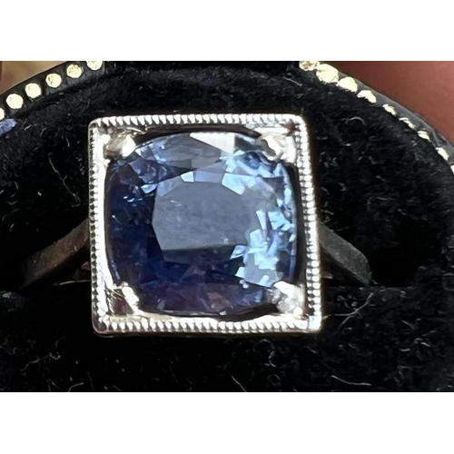 205 - A certified natural 6.72 carat Sri-Lankan sapphire solitaire ring, the square cushion cut stone in w... 