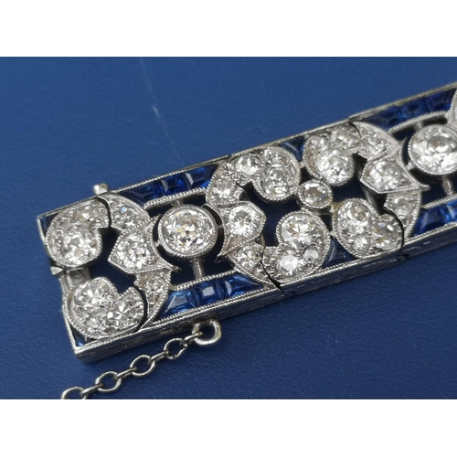 230 - An Edwardian sapphire & diamond set panel bracelet,  of openwork form, having numerous millegrain se... 