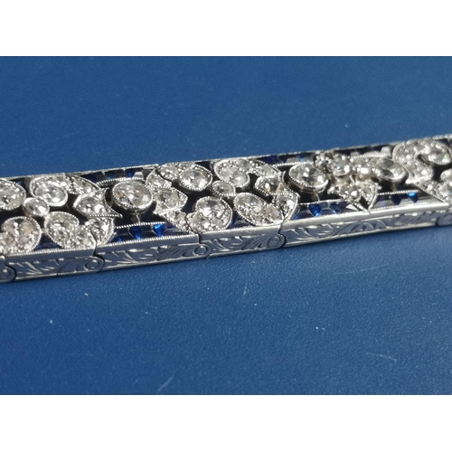 230 - An Edwardian sapphire & diamond set panel bracelet,  of openwork form, having numerous millegrain se... 