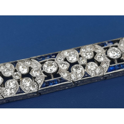 230 - An Edwardian sapphire & diamond set panel bracelet,  of openwork form, having numerous millegrain se... 