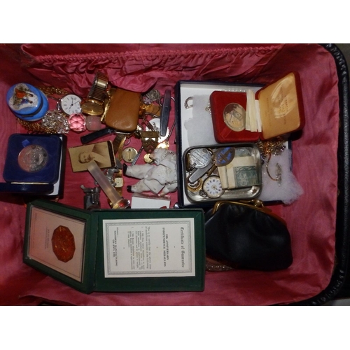 112 - A small suitcase containing some lead farmyard figures, costume jewellery and collectors' items.