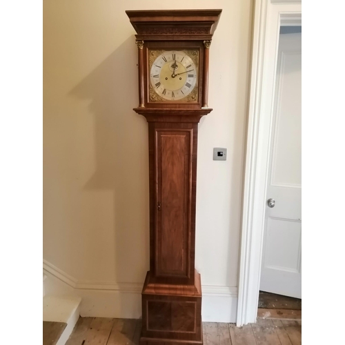 118 - An eight day striking inlaid walnut longcase clock, the square brass dial with subsidiary seconds to... 