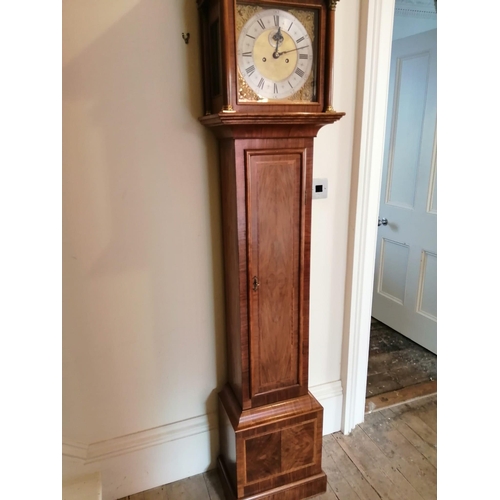 118 - An eight day striking inlaid walnut longcase clock, the square brass dial with subsidiary seconds to... 