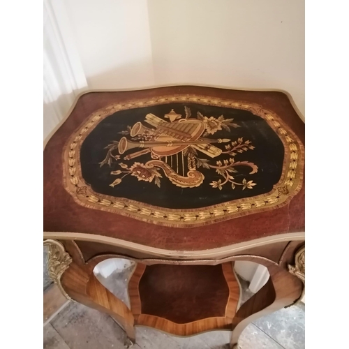 119 - A marquetry inlaid two tier walnut occasional table of shaped form with gilt metal mounts, Height 36... 