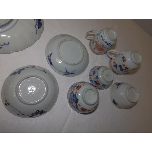 42 - Three 18th/19thC Oriental Imari coloured tea bowls, two cups, two saucers and a Japanese Imari 8.6