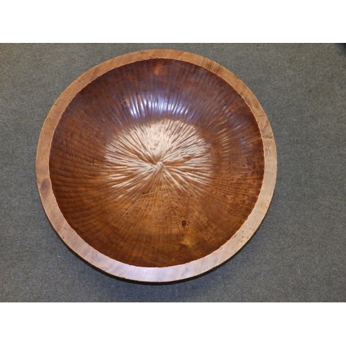 87 - A large hand-carved wooden bowl, 28