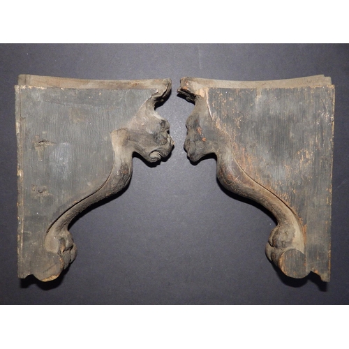 89 - A pair of antique carved oak corbels, believed to have been removed during the dismantling of the El... 