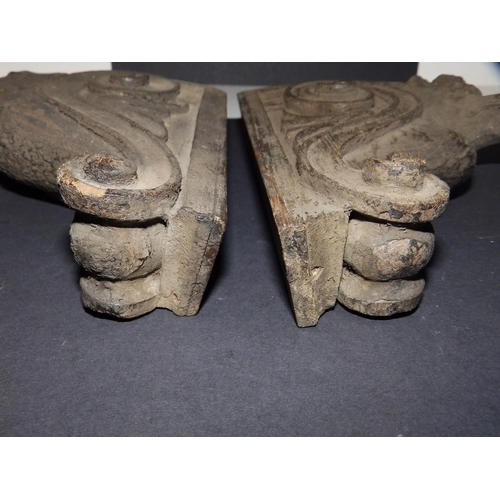 89 - A pair of antique carved oak corbels, believed to have been removed during the dismantling of the El... 