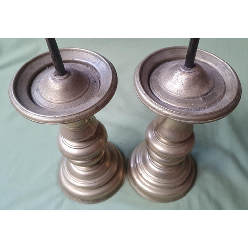 123b - A pair of antique bellmetal pricket candlesticks with iron prickets, 13.5