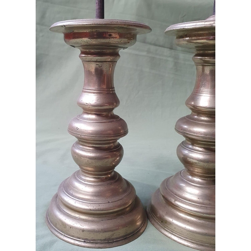 123b - A pair of antique bellmetal pricket candlesticks with iron prickets, 13.5