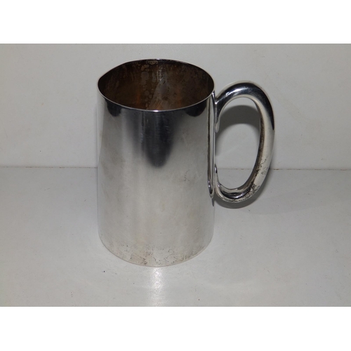 150 - A plain silver tankard of tapering cylinder form retailed by Harrods - RWB, London 1943, 4.75