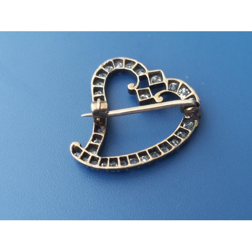 219 - An old cut diamond set 'witches' heart' brooch, of open design, 1