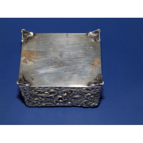 157 - An Edwardian embossed silver rectangular money box with hinged cover - HM, Birmingham 1903, 2.75