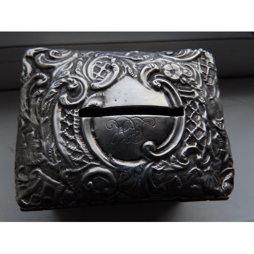 157 - An Edwardian embossed silver rectangular money box with hinged cover - HM, Birmingham 1903, 2.75