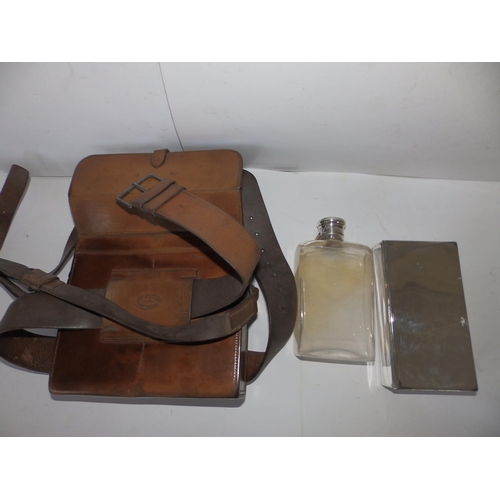 124b - A leather case fitted with a silver top hip flask - London 1900 and a James Dixon EP sandwich tin, t... 