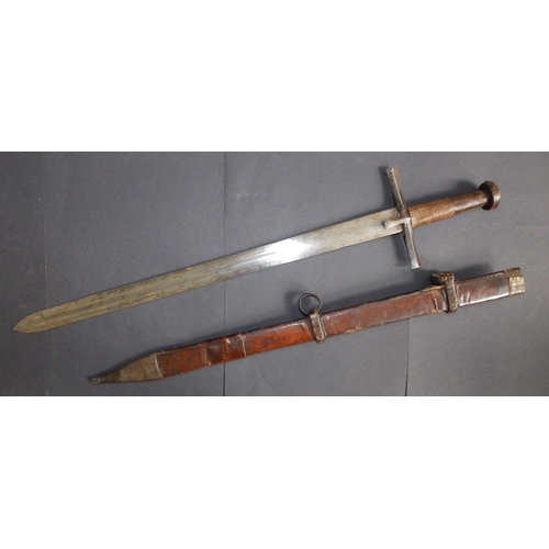 127 - A late 19thC Kaskara sword with leather hilt & scabbard, the blade 25