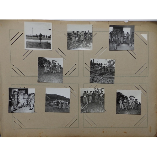 29 - An old postcard album containing various postcards and photographs mainly of military interest, earl... 