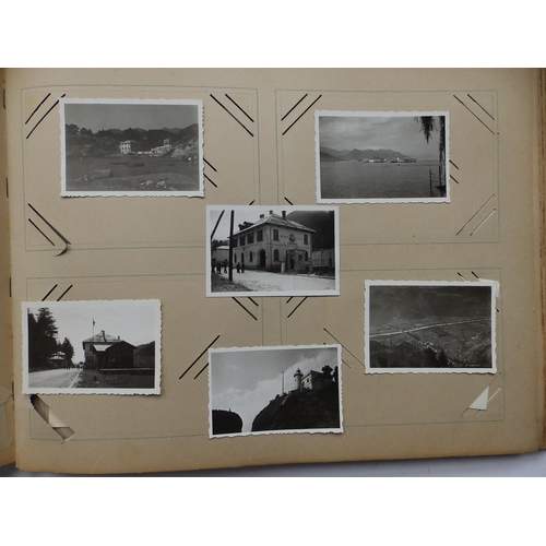 29 - An old postcard album containing various postcards and photographs mainly of military interest, earl... 