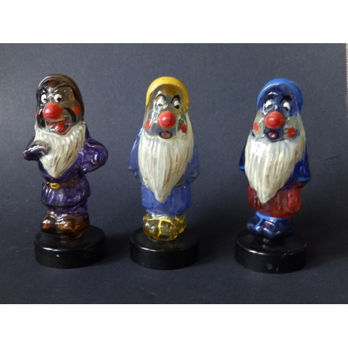 38 - Three 'Seven Dwarfs' glass character scent bottles by Elizabeth Saxon, circa 1960.