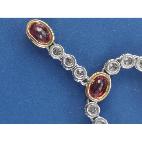 175 - A modern ruby & diamond set necklace in 18ct white & yellow gold, comprising six oval cut rubies in ... 