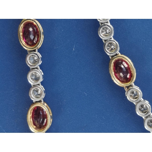 175 - A modern ruby & diamond set necklace in 18ct white & yellow gold, comprising six oval cut rubies in ... 