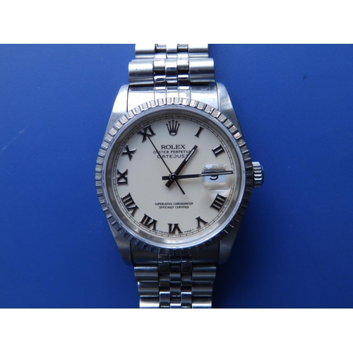 311 - A boxed gent's stainless steel Rolex Datejust 160 with cream dial, Roman numerals, on Jubilee bracel... 