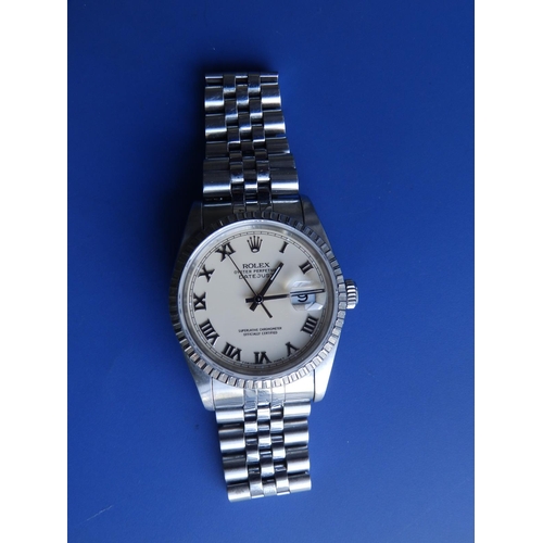 311 - A boxed gent's stainless steel Rolex Datejust 160 with cream dial, Roman numerals, on Jubilee bracel... 