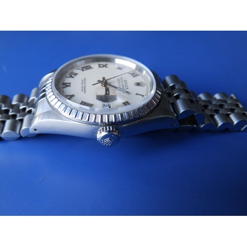 311 - A boxed gent's stainless steel Rolex Datejust 160 with cream dial, Roman numerals, on Jubilee bracel... 