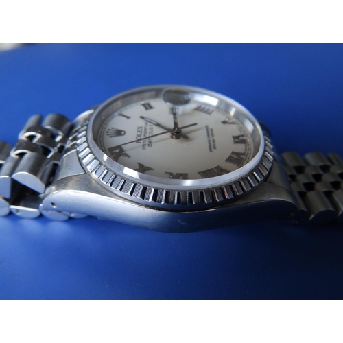 311 - A boxed gent's stainless steel Rolex Datejust 160 with cream dial, Roman numerals, on Jubilee bracel... 