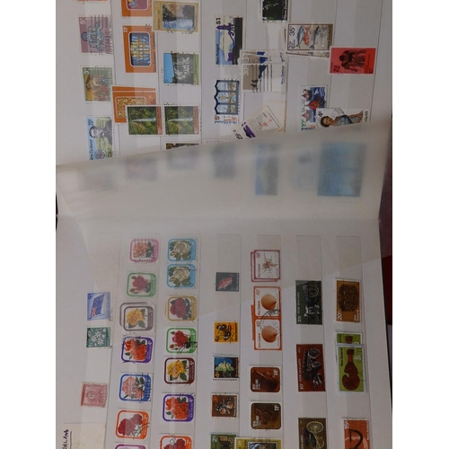 35a - World postage stamps in stock albums and others.