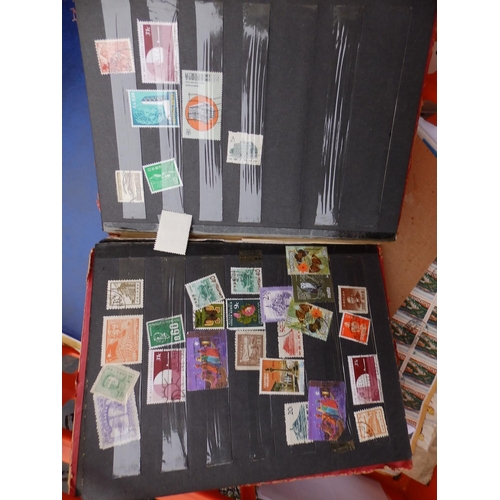 35a - World postage stamps in stock albums and others.