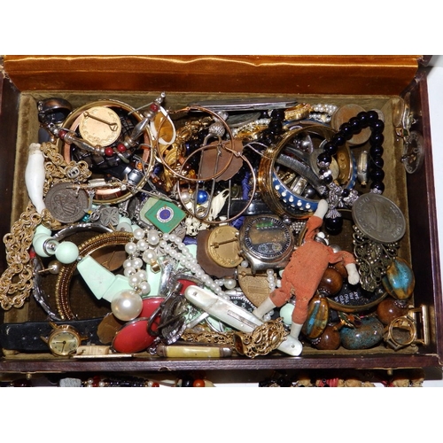 197 - A jewellery box containing costume jewellery, beads and collectors' items.