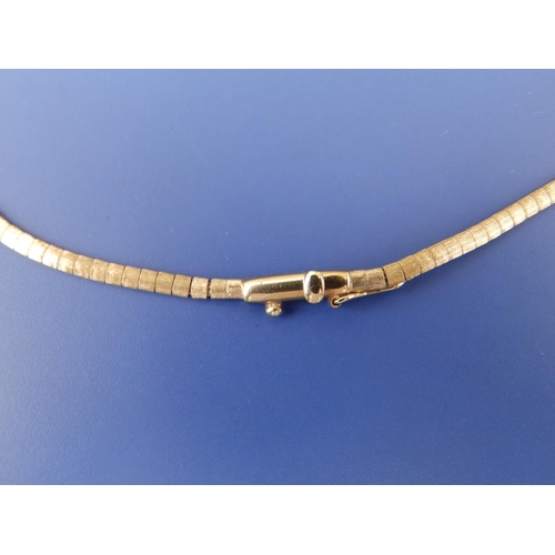 224 - A modern 9ct gold necklace,  15.75