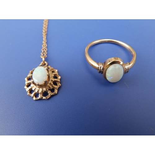 250 - A 9ct opal ring and a pendant necklace. (2)