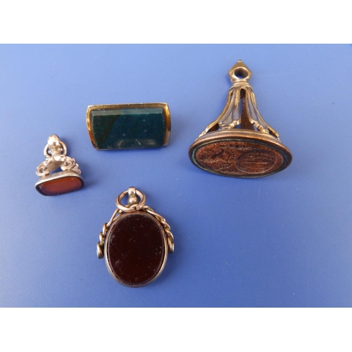 270 - Three Victorian seals and a brooch. (4)