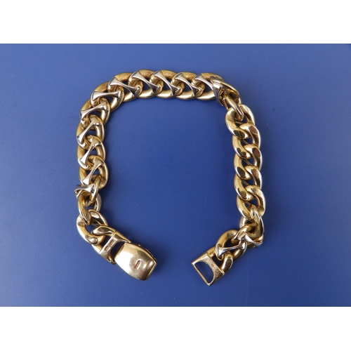 277 - A modern Italian 18K 750 curb link bracelet, 7.5