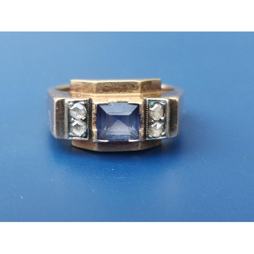 280 - An Egyptian sapphire & diamond set gold band ring of angular art deco form, the central rectangular ... 