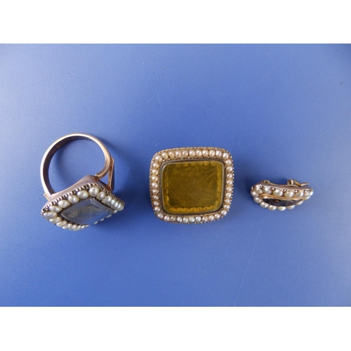 285 - A 19thC memorial ring, the rectangular glazed panel inset with plaited hair within a border of seed ... 